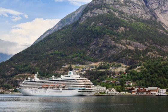 Cruise ship Crystal Symphony moored in port on Eidfjorden
