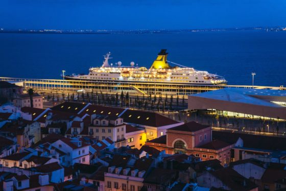 Miradouro de Santa Luzia viewing point in Lisbon city, Portugal with Saga Pearl II cruise ship.