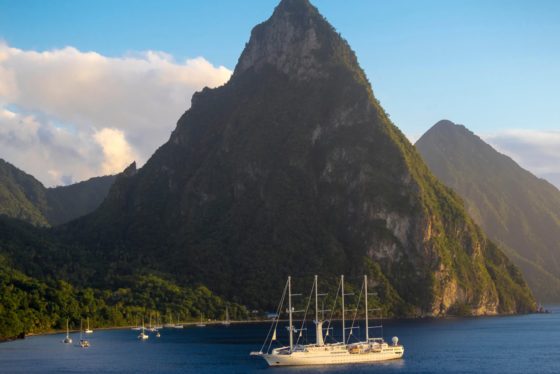 ailing cruise ship Wind Star of Windstar Cruises in front of the volcanoes Gros Piton and Petit Piton,